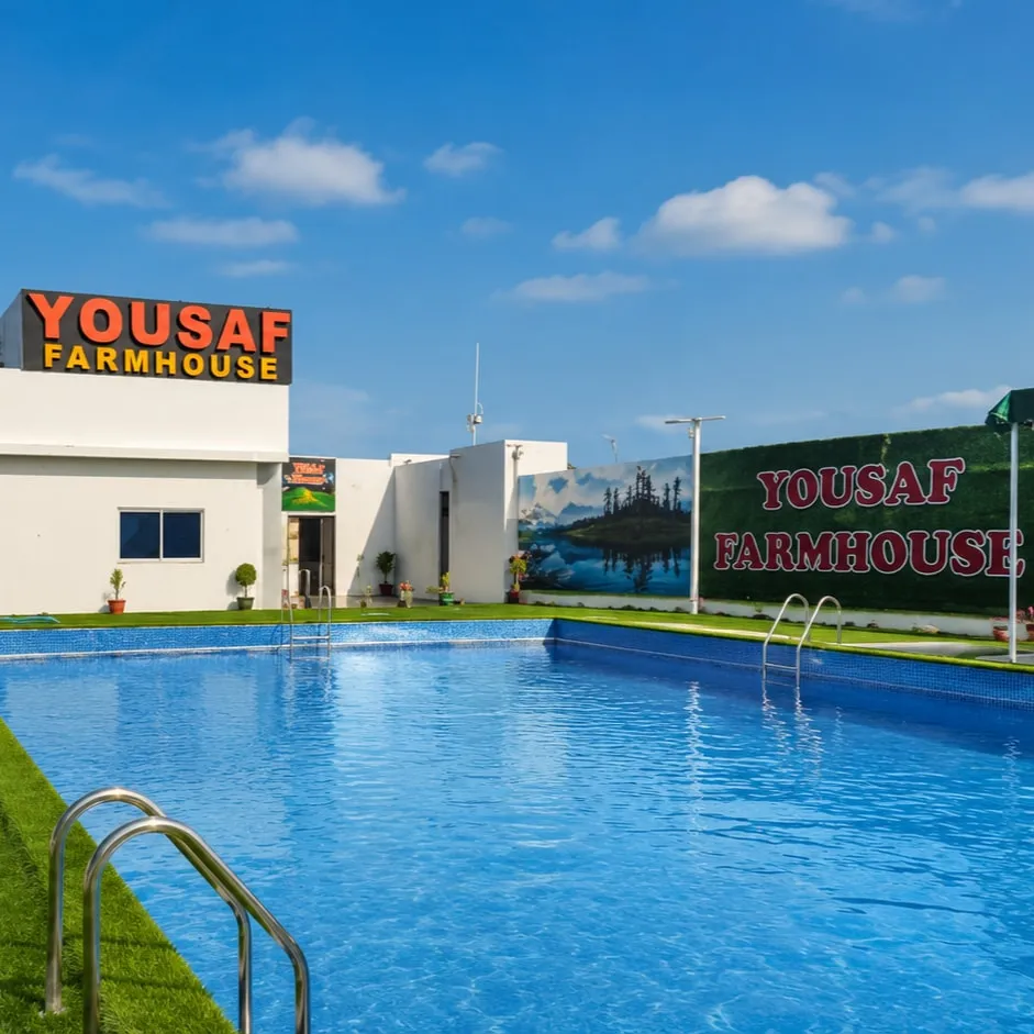 The family swimming pool at Yousaf Farmhouse, Faisalabad, on a clear day